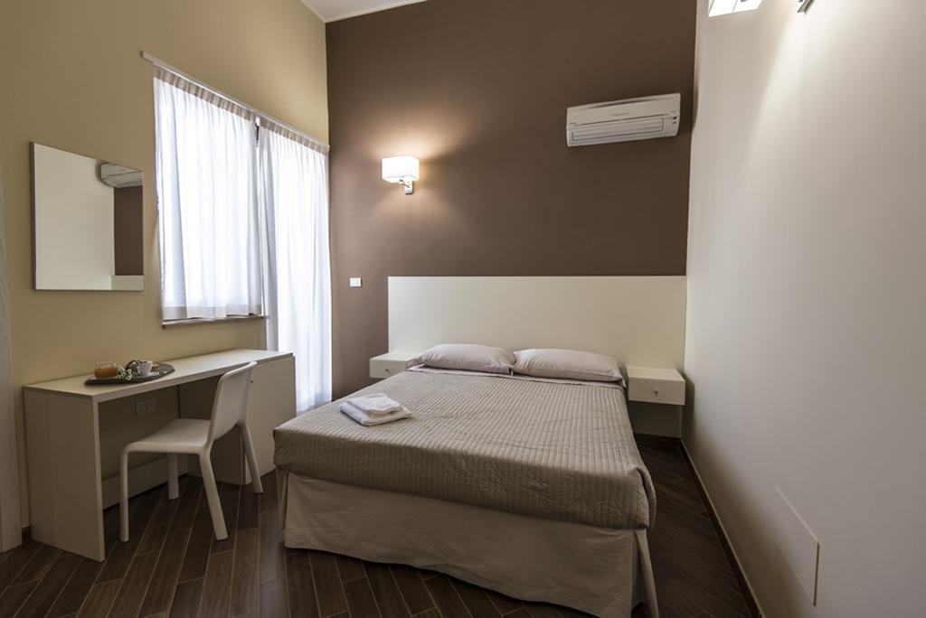 Golden House Hotel Mesagne Quarto foto